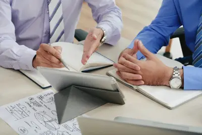 Security consultants reviewing an assessment report