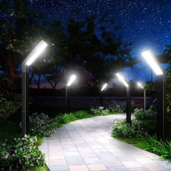 Lighted walkway with landscape lighting at dusk
