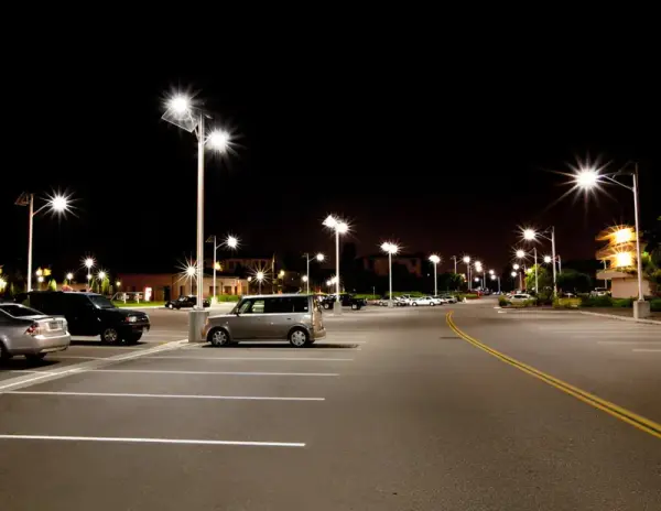 Illuminated multifamily property parking lot at night